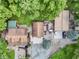 Aerial view of the property showcasing the home, outbuildings, and surrounding landscape at 5240 W 400 N, Fairland, IN 46126