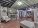 Basement featuring a stone fireplace, painted floors and ample seating at 5240 W 400 N, Fairland, IN 46126