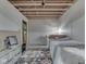 Cozy bedroom with unfinished ceiling, showcasing potential for customization at 5240 W 400 N, Fairland, IN 46126