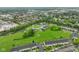 Expansive green spaces complement the residential area in this aerial perspective at 526 W Hunters Dr # C, Carmel, IN 46032
