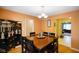 Charming dining area with unique room divider and views into the living spaces, creating an open and inviting atmosphere at 526 W Hunters Dr # C, Carmel, IN 46032