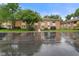 Well-maintained brick condo complex with lush green landscaping and ample parking, perfect for residents and guests at 526 W Hunters Dr # C, Carmel, IN 46032