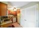 Kitchen with granite countertops, wood cabinets, and stainless steel appliances at 526 W Hunters Dr # C, Carmel, IN 46032