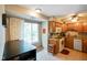 Kitchen with granite countertops, wood cabinets, and stainless steel appliances at 526 W Hunters Dr # C, Carmel, IN 46032