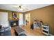 Cozy living room featuring a fireplace and seamlessly connected to other living areas at 526 W Hunters Dr # C, Carmel, IN 46032