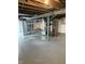 Spacious unfinished basement with exposed ductwork at 5378 Rosslyn Ave, Indianapolis, IN 46220