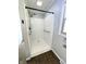 Newly updated bathroom with accessible shower and modern fixtures at 540 Lazy Ln, Greenwood, IN 46142