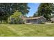 Well-maintained single-story home with a manicured lawn, landscaping, and a welcoming front entrance at 540 Lazy Ln, Greenwood, IN 46142