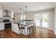 Bright, updated kitchen with stainless appliances, white cabinets, and granite countertops at 540 Lazy Ln, Greenwood, IN 46142
