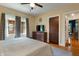 Bedroom with hardwood floors, a ceiling fan, a neutral color scheme and large closet at 5424 Broadway St, Indianapolis, IN 46220