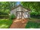 Detached garage with gravel driveway at 5424 Broadway St, Indianapolis, IN 46220