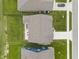 Aerial view of the property showcasing its layout, backyard patio, and surrounding landscape at 5723 Arctic Run Dr, Noblesville, IN 46062