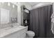Elegant bathroom featuring a granite countertop, contemporary fixtures, and ample storage at 5723 Arctic Run Dr, Noblesville, IN 46062