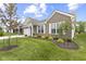 Beautiful home featuring manicured lawn, a brick facade and white trim at 5723 Arctic Run Dr, Noblesville, IN 46062