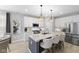 Modern kitchen with stainless steel appliances and white cabinetry at 5723 Arctic Run Dr, Noblesville, IN 46062