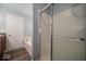 Bathroom showcasing a bathtub, shower, and door; a bright and functional space at 5859 Edelle Dr, Indianapolis, IN 46237