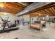 Spacious unfinished basement area with concrete floor, exposed wood beams, and recreational space at 5997 Hollythorn Pl, Carmel, IN 46033
