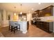 Well-equipped kitchen featuring stainless steel appliances, granite countertops, and a convenient breakfast bar at 610 Sawtooth St, Westfield, IN 46074