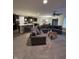 Spacious living room open to kitchen with large sectional and eat in kitchen at 610 Sawtooth St, Westfield, IN 46074