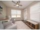 Bright sunroom with neutral tones, comfortable seating, and natural light, perfect for relaxing at 610 Sawtooth St, Westfield, IN 46074