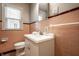 Bathroom featuring a classic vanity with tile wall and natural light at 6146 Burlington Ave, Indianapolis, IN 46220