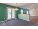 Cozy dining room featuring carpeted floors and a chandelier at 626 Tulip Poplar Ct, Mooresville, IN 46158