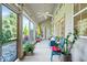 Inviting screened-in porch perfect for outdoor entertaining with comfortable seating at 6528 Fountain Springs Blvd, Indianapolis, IN 46236
