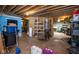 Unfinished basement featuring exposed beams, ample storage, and potential for customization at 6532 Amherst Way, Zionsville, IN 46077