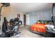 Bedroom with blue tree wall, desk setup, and bed at 6532 Amherst Way, Zionsville, IN 46077
