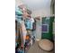Walk-in closet featuring ample shelving, hanging storage, and a neutral color scheme at 6532 Amherst Way, Zionsville, IN 46077