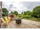Wide angle view of a wooden deck showing outdoor furniture and an open backyard view at 6532 Amherst Way, Zionsville, IN 46077