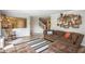 Comfortable living room with a brown sectional, neutral decor, and decorative wall art at 6532 Amherst Way, Zionsville, IN 46077