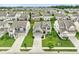 Stunning aerial view showcasing the home's location within a well-planned community with lush green spaces at 6670 Shooting Star Dr, Whitestown, IN 46075
