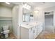 Bathroom featuring tiled floors, dual sink vanity, large mirror, and great natural light at 6670 Shooting Star Dr, Whitestown, IN 46075