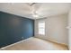 Bedroom featuring neutral paint, carpet, a ceiling fan, and large window at 6670 Shooting Star Dr, Whitestown, IN 46075