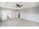 Spacious bedroom featuring neutral paint, carpet, a ceiling fan, and adjoining bathroom and closet at 6670 Shooting Star Dr, Whitestown, IN 46075