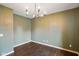 Spacious dining room with modern lighting at 6670 Shooting Star Dr, Whitestown, IN 46075