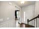 Inviting home foyer with hardwood floors, open access to study, and natural light at 6670 Shooting Star Dr, Whitestown, IN 46075