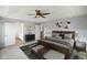 Relaxing main bedroom featuring a comfortable bed, soft lighting, and an ensuite bathroom at 6670 Shooting Star Dr, Whitestown, IN 46075
