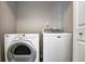 Laundry area with a white Whirlpool dryer and white Maytag washer at 6740 Sundown S Dr, Indianapolis, IN 46254