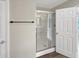 Bright bathroom featuring a glass-enclosed shower with modern fixtures at 6933 Sonora Blvd, Clermont, IN 46234
