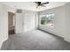 Bright bedroom features an open door and a window view at 6933 Sonora Blvd, Clermont, IN 46234