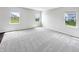 Bright bedroom with multiple windows offering lots of natural light and outdoor views at 6933 Sonora Blvd, Clermont, IN 46234