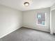 Neutral bedroom with carpet and a window at 6933 Sonora Blvd, Clermont, IN 46234