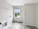 Bright laundry room with a window at 6933 Sonora Blvd, Clermont, IN 46234