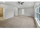 Spacious Primary bedroom featuring a ceiling fan, and an ensuite bathroom at 770 Tulip Ln, Greenwood, IN 46143