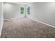 Neutral bedroom with carpet and natural light at 770 Tulip Ln, Greenwood, IN 46143