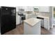 Functional kitchen with modern appliances and island at 770 Tulip Ln, Greenwood, IN 46143