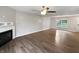 Bright living room with hardwood floors and a fireplace at 770 Tulip Ln, Greenwood, IN 46143