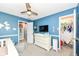 The Bedroom features blue walls, white furniture, and a closet at 7755 Dayflower Ct, Noblesville, IN 46062